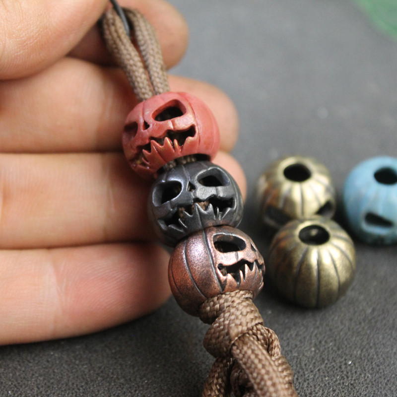 Outdoor Lighting Pendant - ฮาโลวีนฟักทองSkull FaceโคมไฟEDCทองเหลืองมีดลูกปัดDIY Paracord Lanyardจี้เครื่องมือกลางแจ้งHangingsอุปกรณ์เสริม